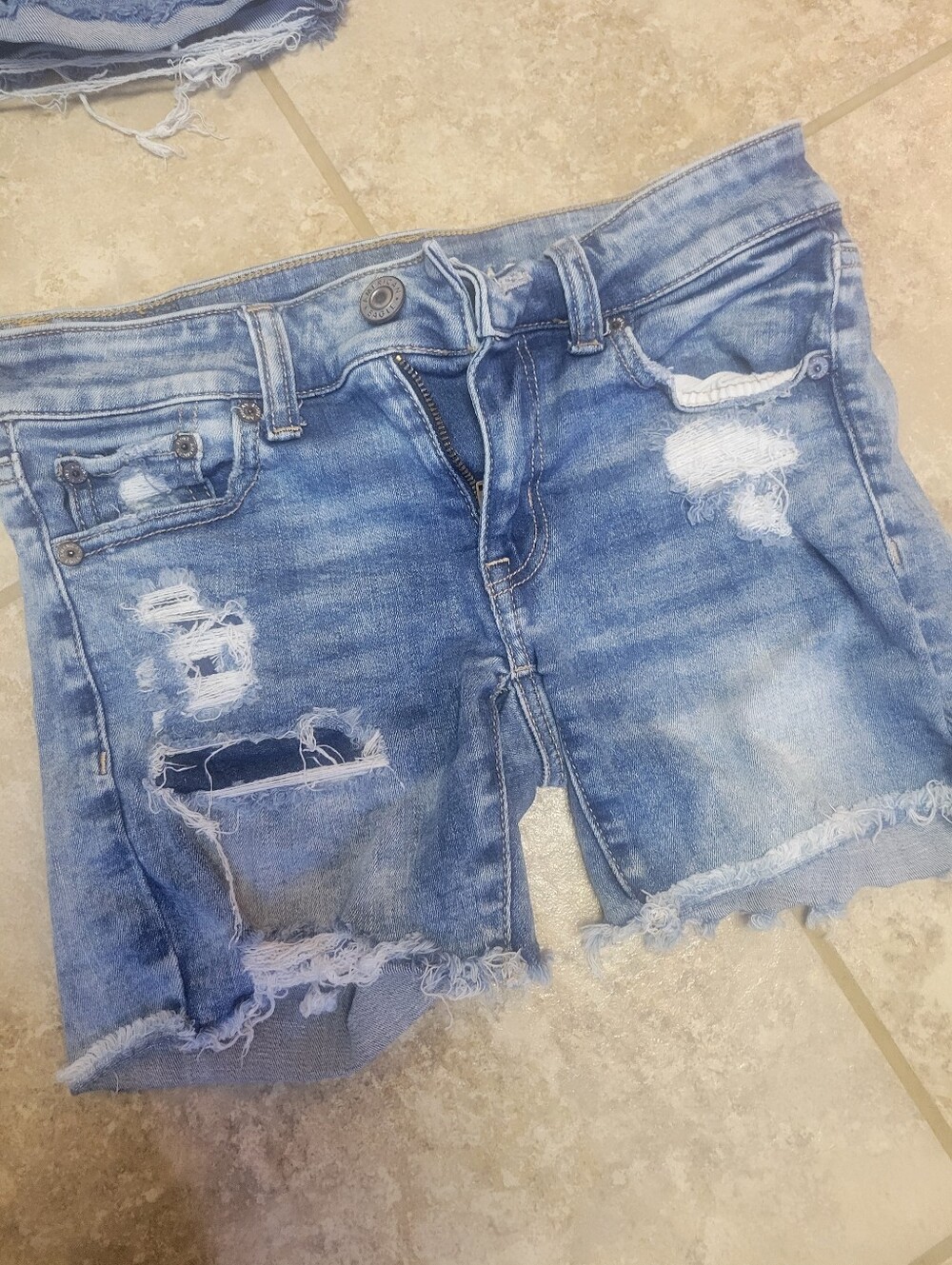 Light Blue Distressed Denim Women’s Shorts